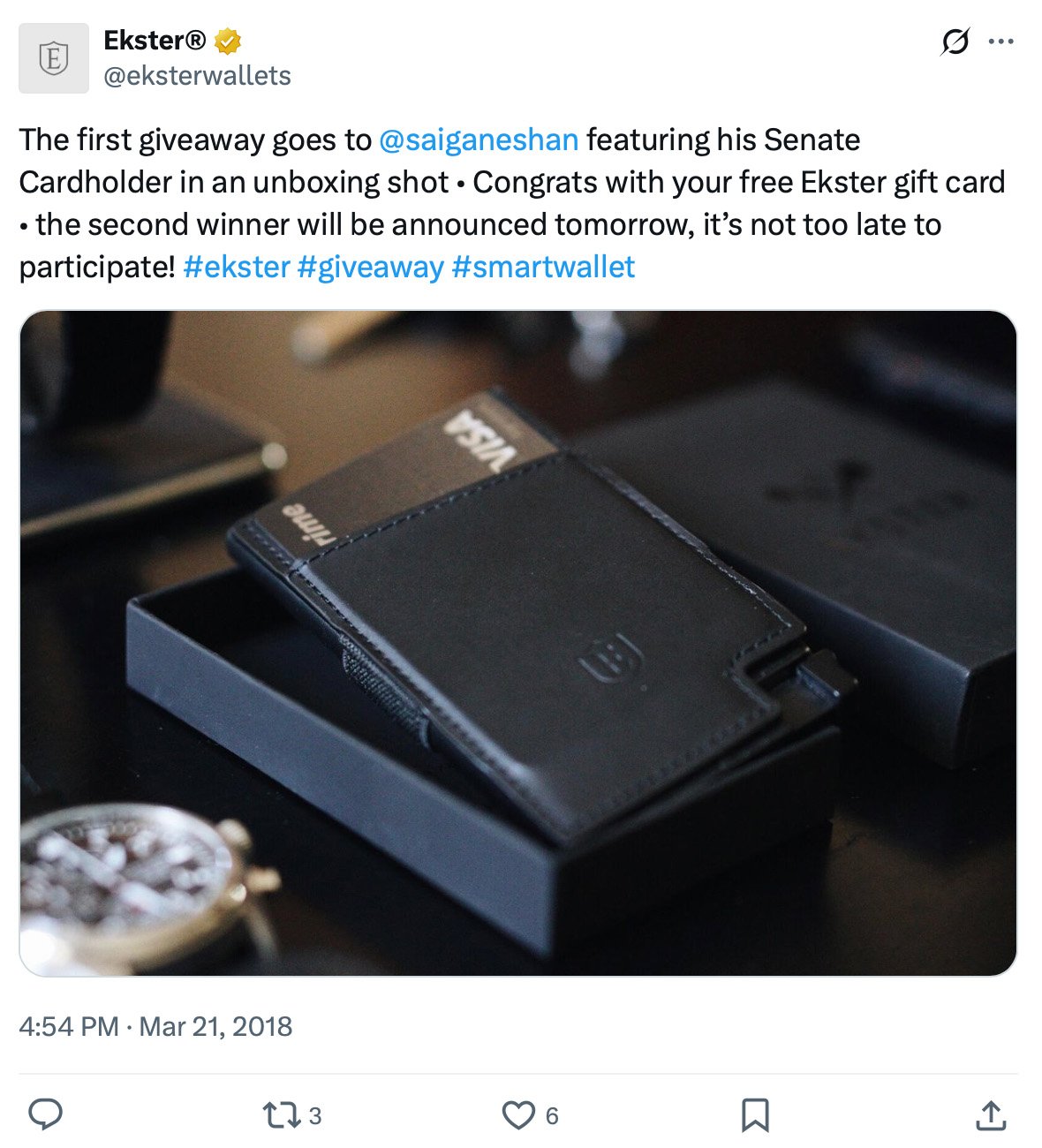 Ekster giveaway winner announced with smart wallet prize Ekster Senate Cardholder wallet shown in black packaging with visible Visa card inserted
