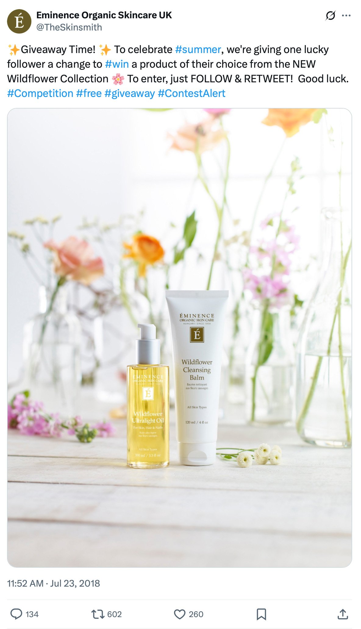 Eminence skincare products on a floral background for summer giveaway