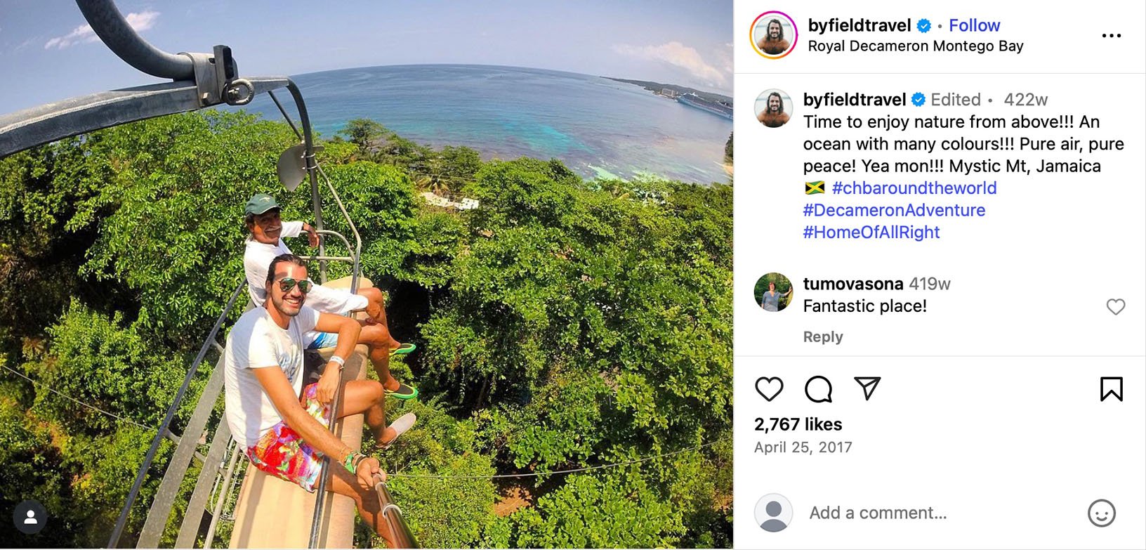 Byfield Travel captures Mystic Mountain views in Jamaica Three people smiling on a ski lift-style ride above a lush green forest with ocean views in the background