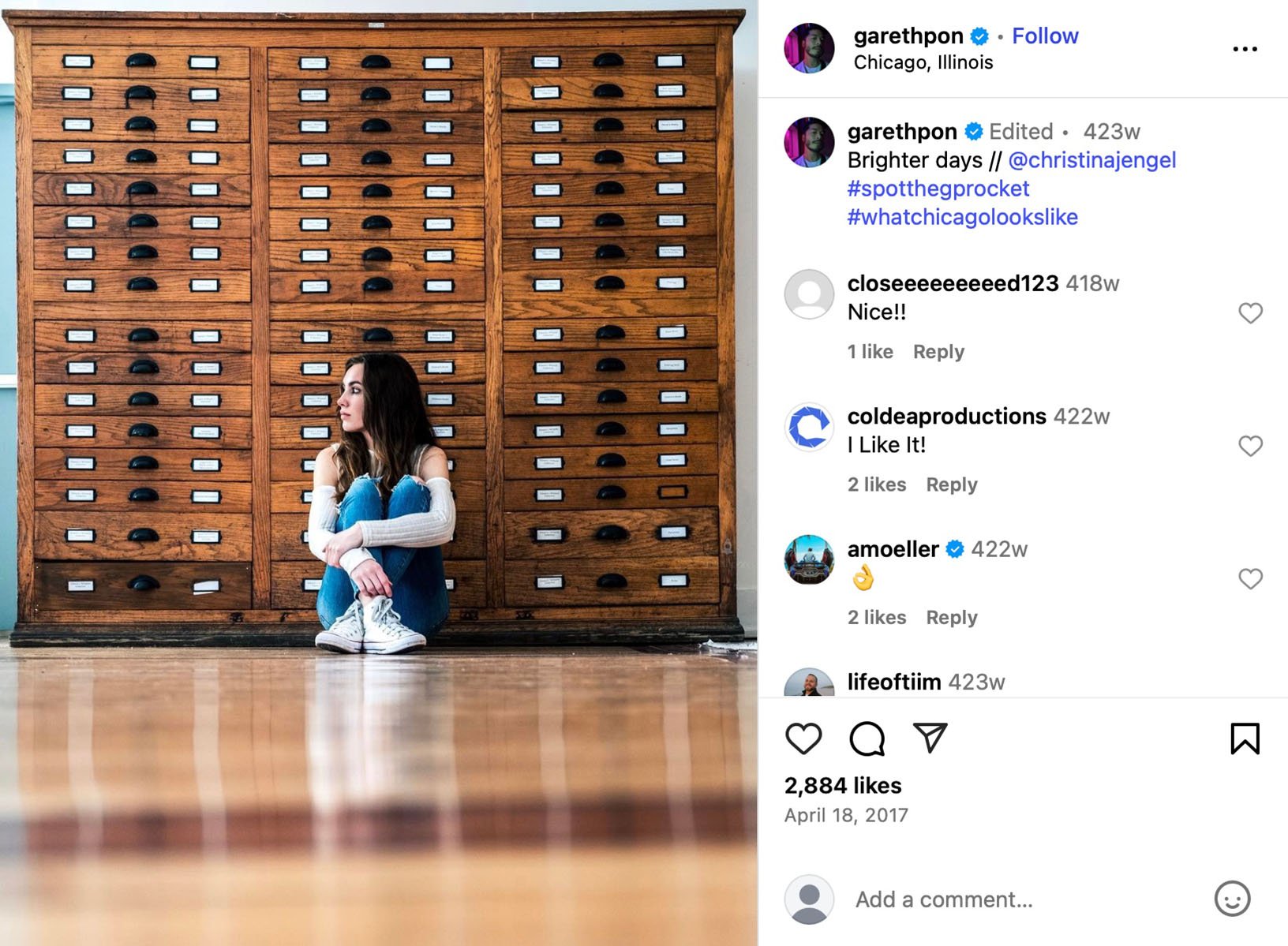 Gareth Pon captures minimalist portrait in Chicago Woman sitting on the floor in front of a tall wooden cabinet with dozens of drawers