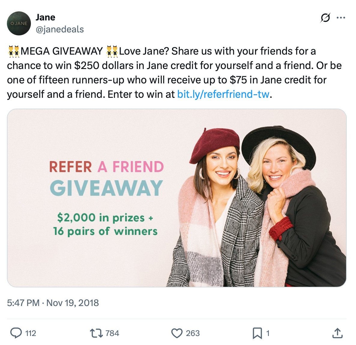 Two smiling women in hats promoting Jane's refer a friend giveaway