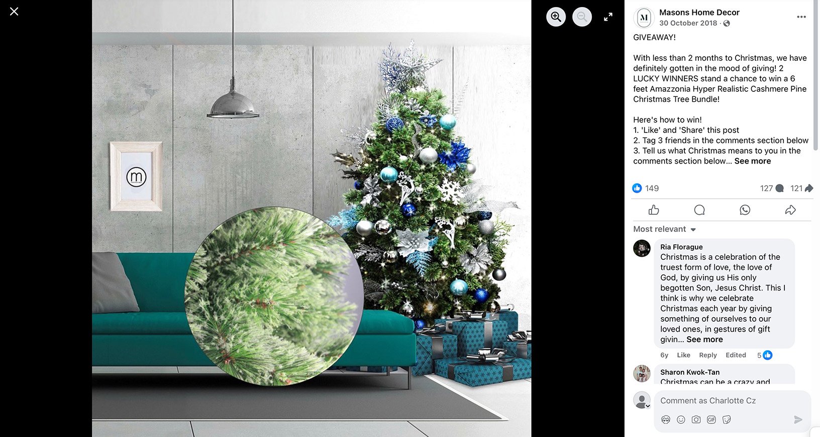Christmas tree decorated in blue and silver ornaments with wrapped gifts and giveaway promotion