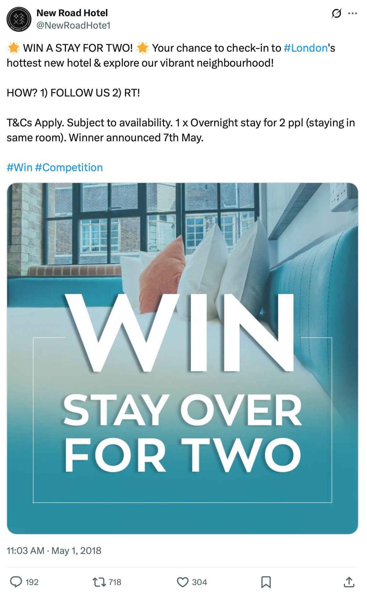 Hotel room with blue seating and text promoting New Road Hotel stay for two giveaway