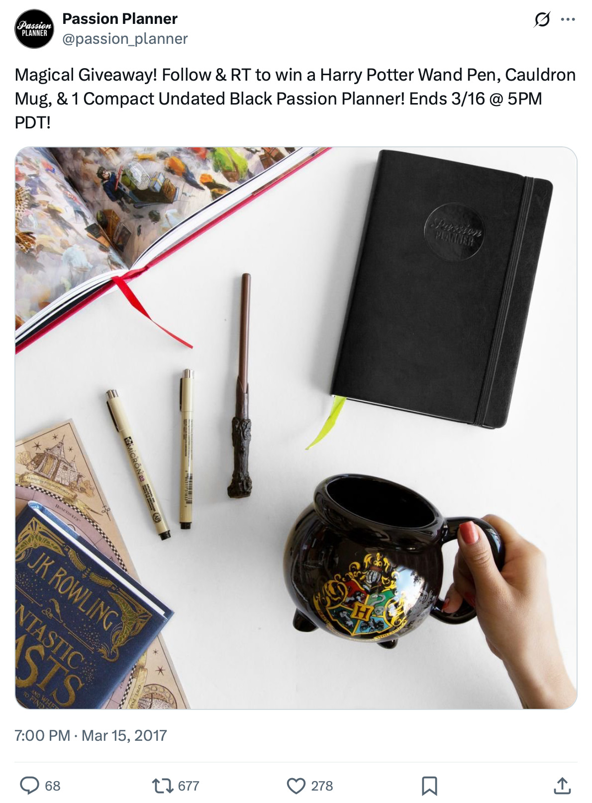 Passion Planner giveaway includes planner and Harry Potter bundle Flat lay of a Passion Planner, Harry Potter wand pen, cauldron mug, and Fantastic Beasts books