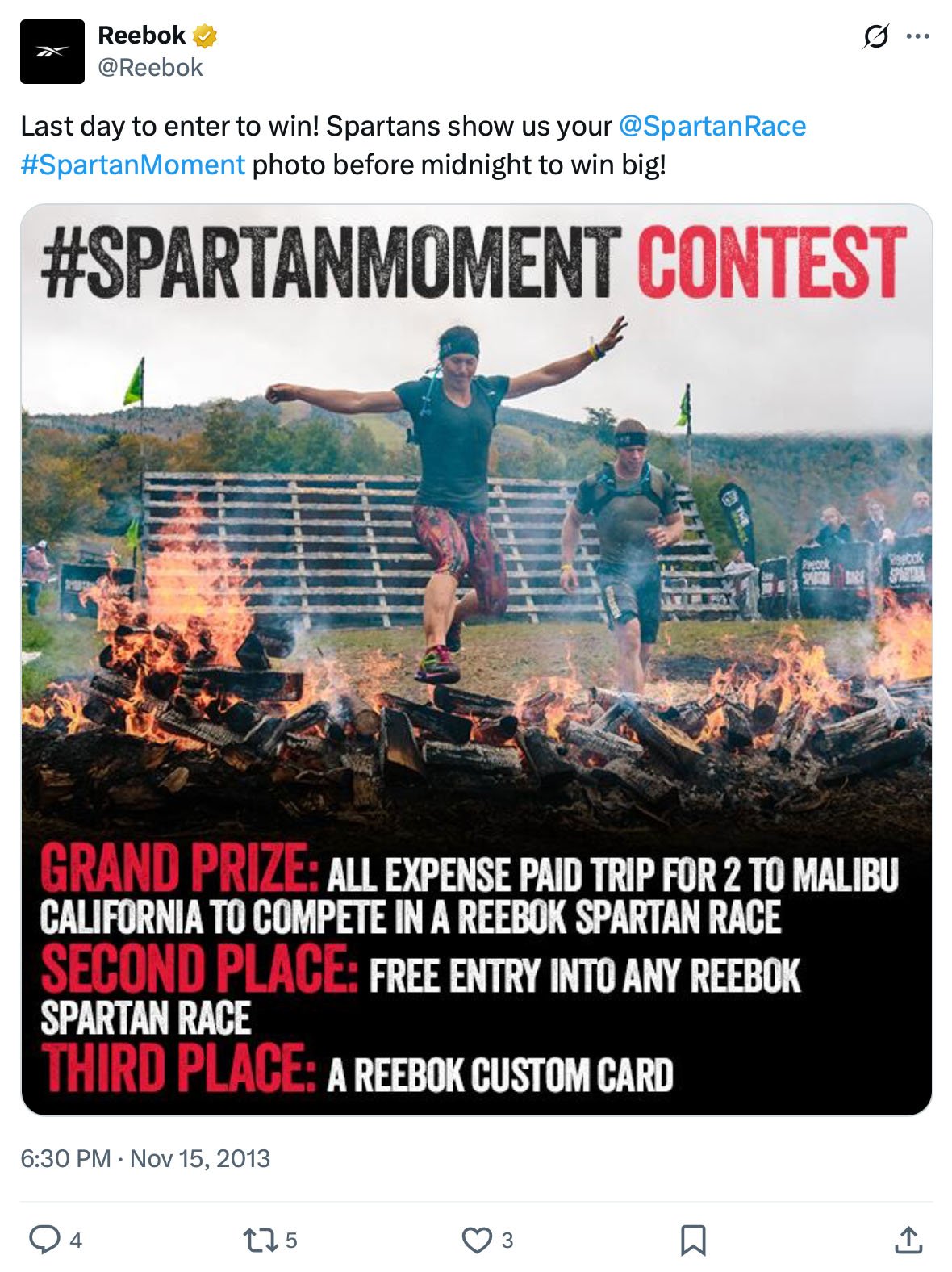 Reebok challenges Spartans to share their #SpartanMoment for a chance to win big Participants jumping over flames during a Spartan Race, promoting a Reebok contest with prizes for the best #SpartanMoment photo