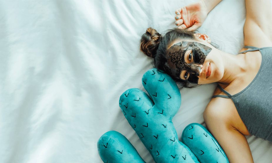 Model wearing Trefiel face mask while lying down